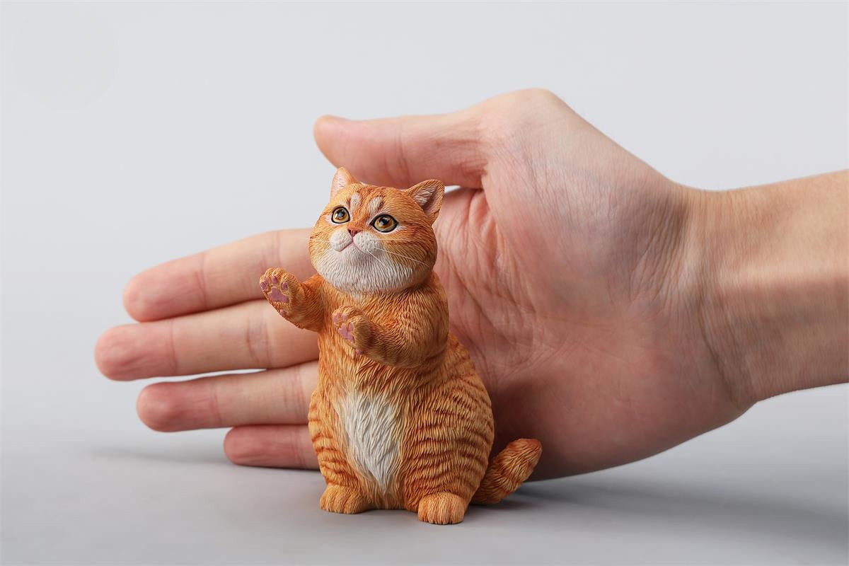 A lifelike string-playing cat figurine crafted from resin, featuring a realistic cat with expressive eyes playing a violin. The sculpture showcases intricate fur details and a beautifully designed musical instrument, making it an excellent collectible or home decor piece for cat lovers and music enthusiasts.