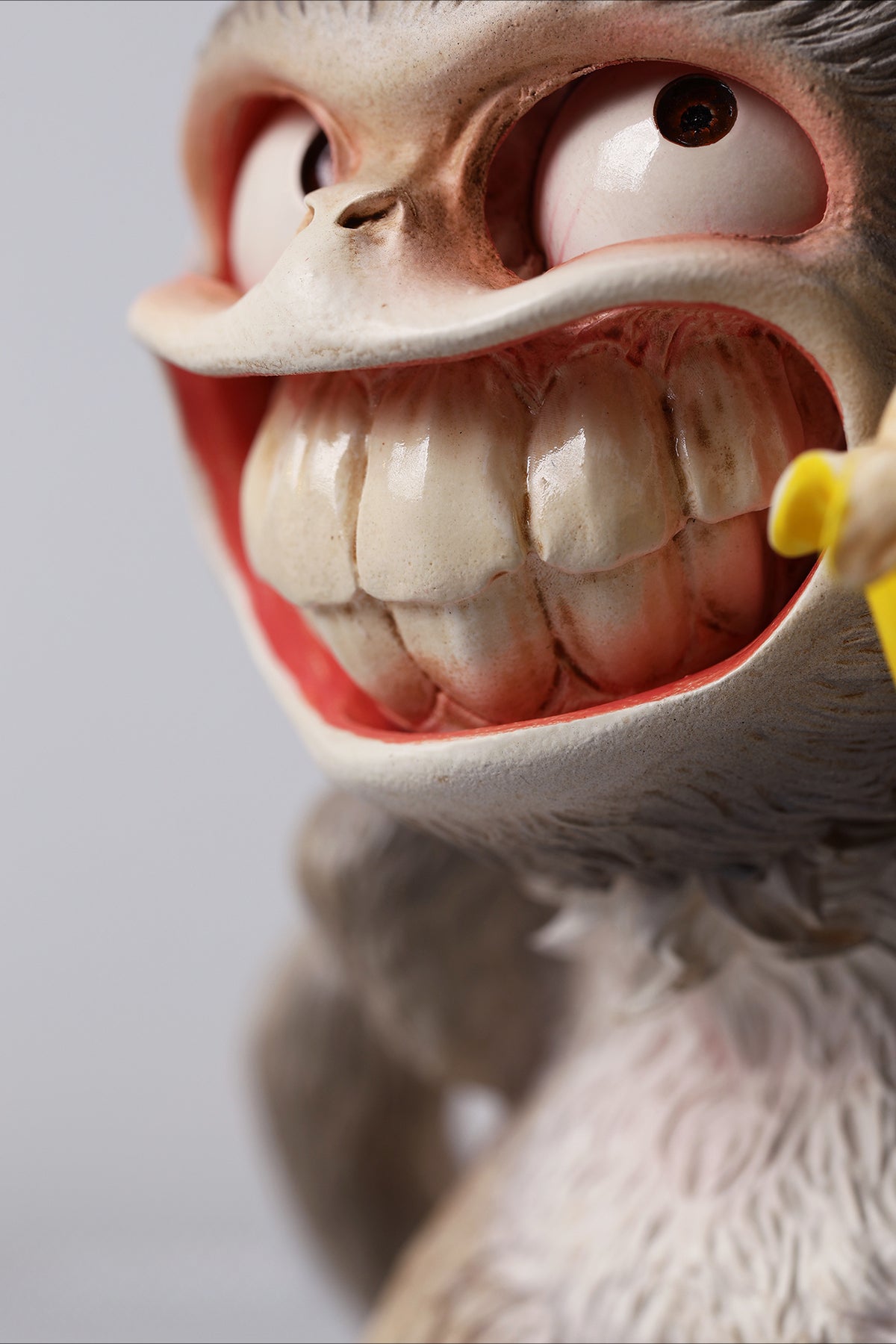 Hand-painted resin monkey figurine featuring a playful expression and banana. Collectible animal figurine with intricate detailing and high-quality craftsmanship. A must-have for monkey lovers, art collectors, and unique home décor enthusiasts.