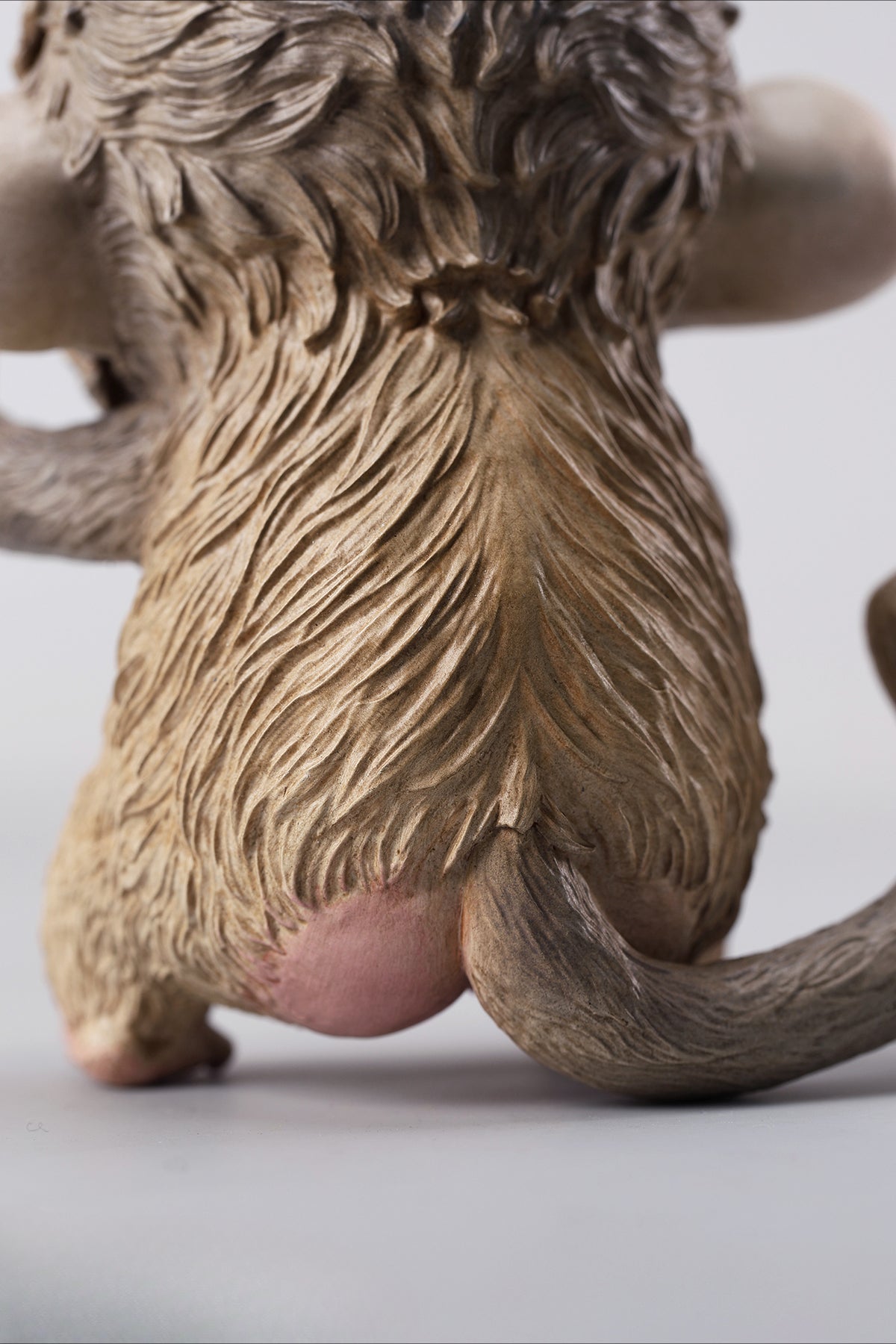 Hand-painted resin monkey figurine featuring a playful expression and banana. Collectible animal figurine with intricate detailing and high-quality craftsmanship. A must-have for monkey lovers, art collectors, and unique home décor enthusiasts.