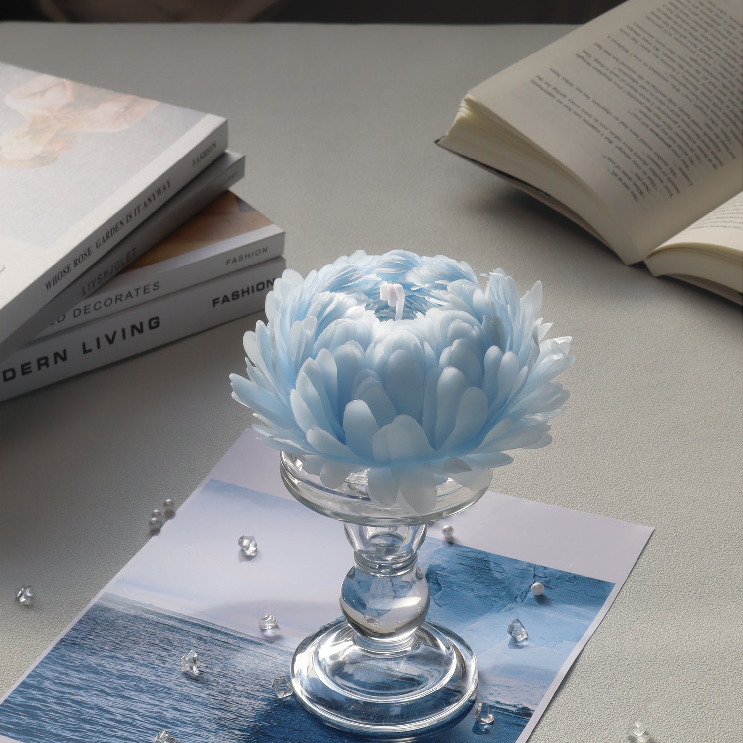 A handmade peony flower candle in an elegant gift box, featuring a delicate design and infused with a soothing peony fragrance, perfect for gifting and creating a relaxing atmosphere in any room. The candle is shown with decorative elements to enhance its aesthetic appeal.