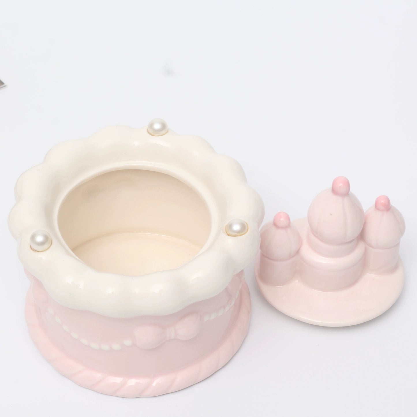 Pink Ceramic Round Pet Cremation Urn provides a secure and elegant way to store cat or dog ashes. With a smooth round design, soft pastel pink color, and durable ceramic craftsmanship, it’s perfect for home memorial display while keeping your pet’s memory safe and close.