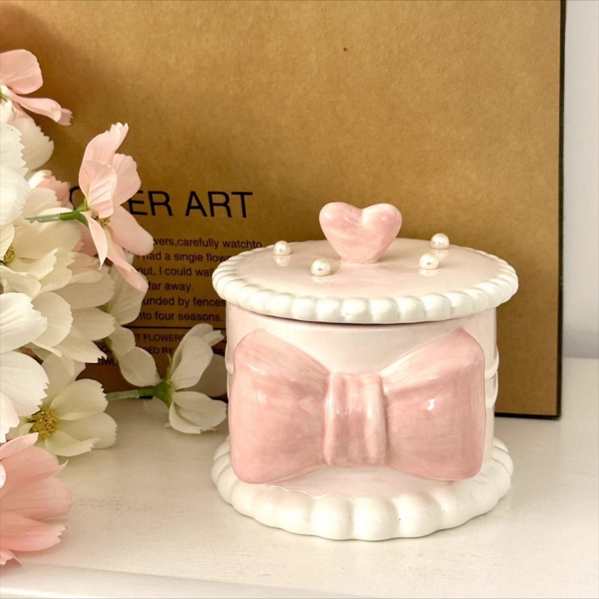 Pink Ceramic Round Pet Cremation Urn provides a secure and elegant way to store cat or dog ashes. With a smooth round design, soft pastel pink color, and durable ceramic craftsmanship, it’s perfect for home memorial display while keeping your pet’s memory safe and close.