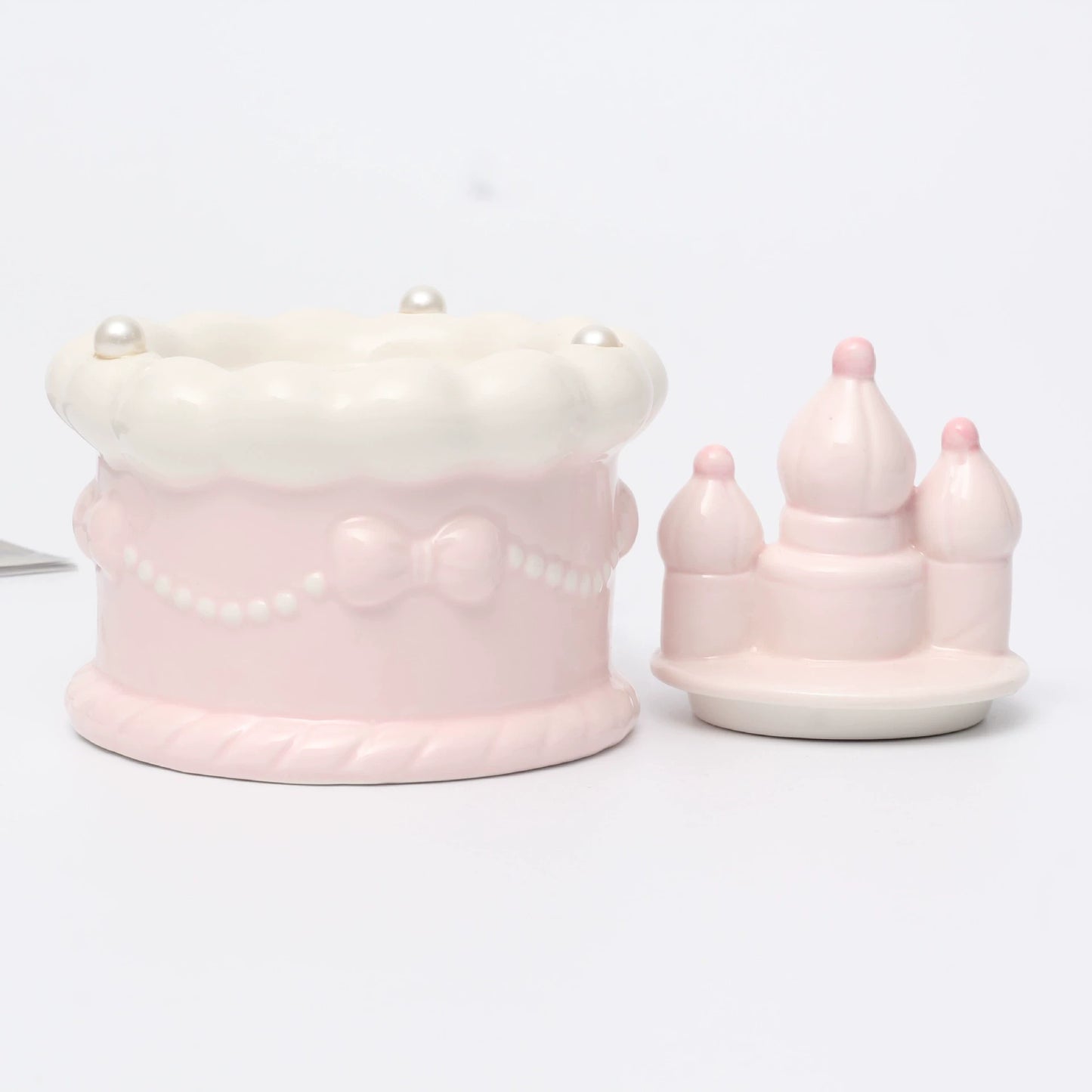 Pink Ceramic Round Pet Cremation Urn provides a secure and elegant way to store cat or dog ashes. With a smooth round design, soft pastel pink color, and durable ceramic craftsmanship, it’s perfect for home memorial display while keeping your pet’s memory safe and close.