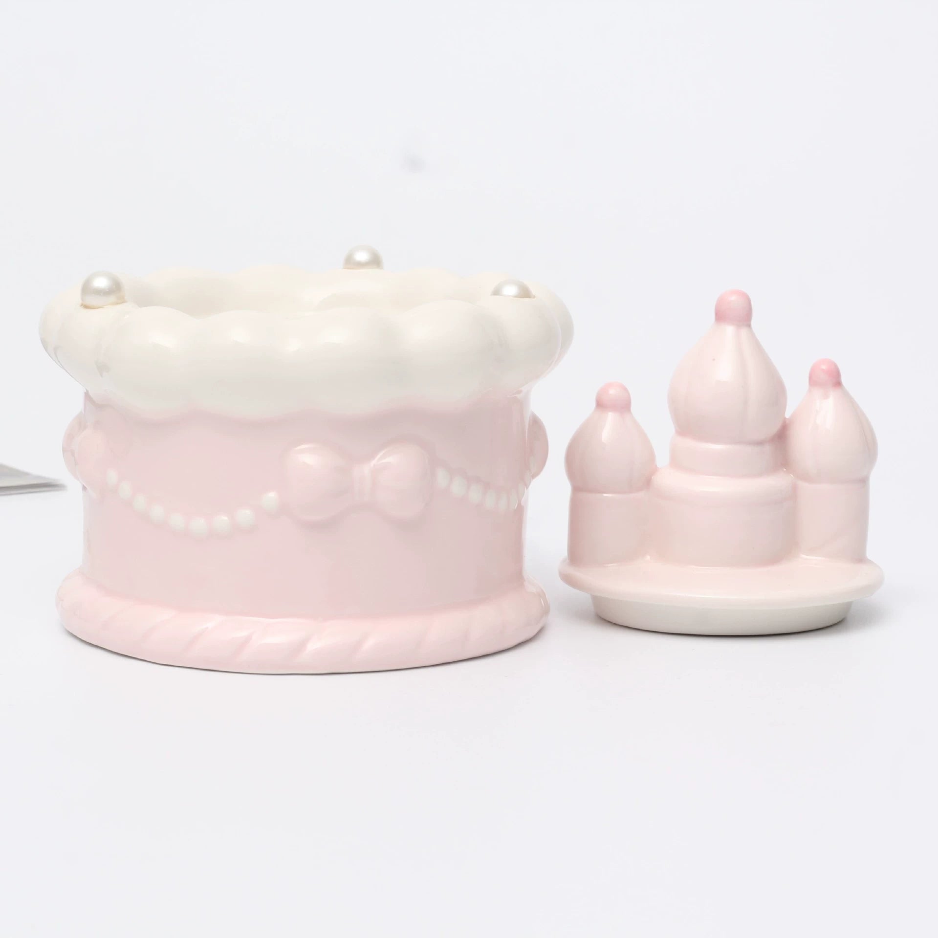 Pink Ceramic Round Pet Cremation Urn provides a secure and elegant way to store cat or dog ashes. With a smooth round design, soft pastel pink color, and durable ceramic craftsmanship, it’s perfect for home memorial display while keeping your pet’s memory safe and close.