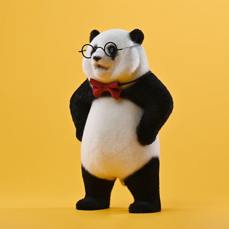 This adorable flocked panda figurine features a realistic texture, handcrafted details, and a soft-touch surface. It includes removable accessories like a bow tie, glasses, and a backpack, making it a customizable collectible. Made from high-quality resin, cloth, and metal, this panda sculpture is a perfect home decor piece or gift for panda lovers.