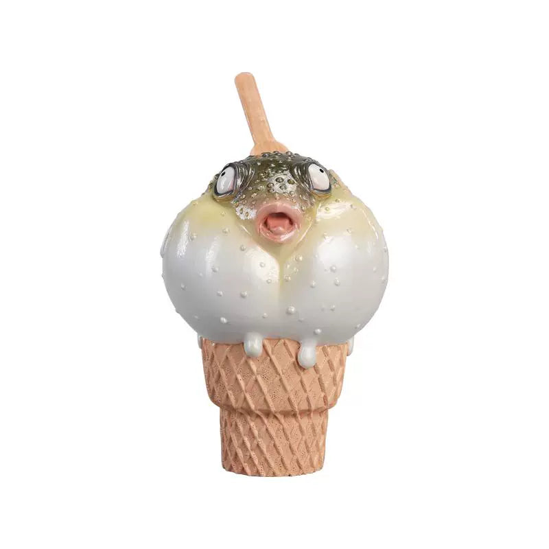 A highly detailed pufferfish ice cream figurine featuring a realistic fish with bulging eyes and textured scales, sitting on an intricately sculpted ice cream cone base. Made of premium resin, this collectible novelty item is perfect for unique decor lovers and marine life enthusiasts.