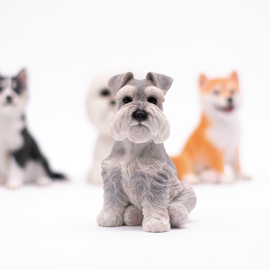 A collection of small dog models featuring a Husky, Shiba Inu, Schnauzer, and Bichon. Each model captures the lifelike details and distinct characteristics of these beloved dog breeds, making them perfect for dog lovers and collectors.