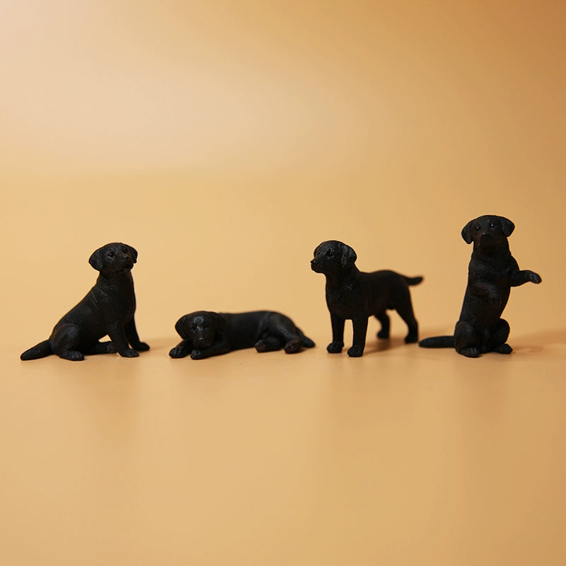 A collection of small Mini Shiba Inu and Labrador dog models showcasing various poses. The Shiba Inu models are in black and tan, while the Labrador models are black. Each model captures lifelike details, perfect for dog lovers and collectors.