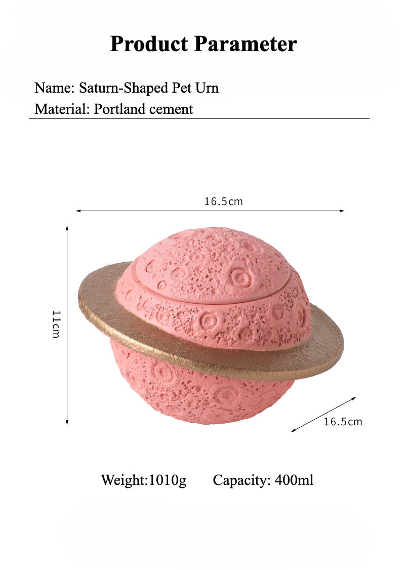 Discover the Pink Saturn-Shaped Pet Urn, a heartfelt memorial ashes holder crafted from durable Portland cement for North American pet owners. This whimsical planet-inspired design in soft pink, complete with a gold ring and textured craters, offers secure storage for up to 400ml of ashes from small pets. Measuring 16.5cm wide and 11cm tall, it weighs 1010g and fits perfectly on shelves or mantels, blending seamlessly into home decor. Ideal for cat or dog lovers seeking a unique tribute, it addresses grief 