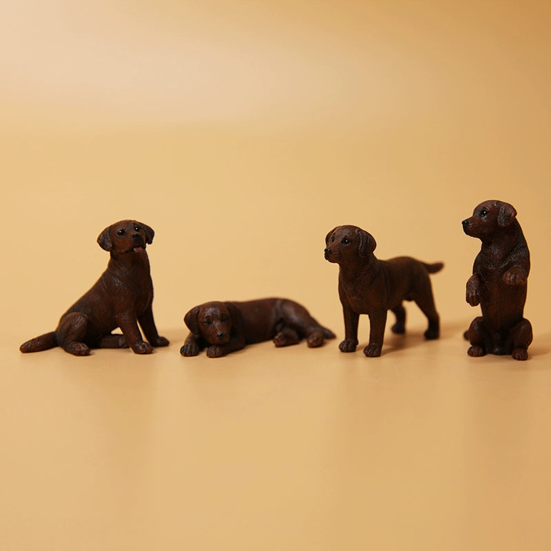 A collection of small Mini Shiba Inu and Labrador dog models showcasing various poses. The Shiba Inu models are in black and tan, while the Labrador models are black. Each model captures lifelike details, perfect for dog lovers and collectors.