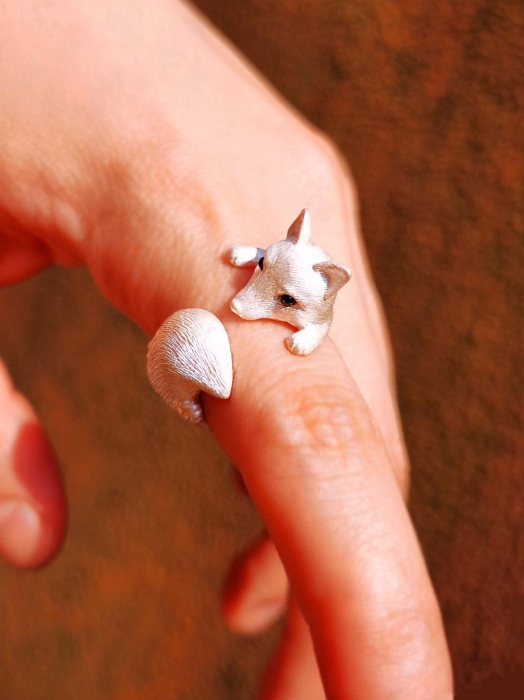 Sterling Silver Fox and Rose Ring featuring detailed fur and petal designs, with gemstone eyes in a secure bezel setting, handcrafted from solid 925 sterling silver, available in silver and antique black finishes, showcasing artisan craftsmanship and unique, customizable design.