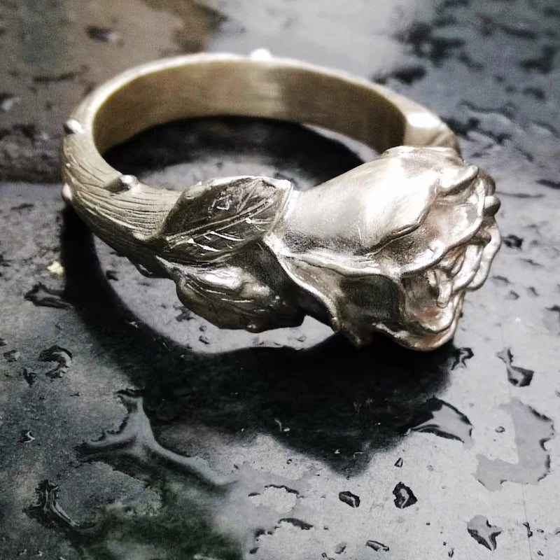 Sterling Silver Fox and Rose Ring featuring detailed fur and petal designs, with gemstone eyes in a secure bezel setting, handcrafted from solid 925 sterling silver, available in silver and antique black finishes, showcasing artisan craftsmanship and unique, customizable design.