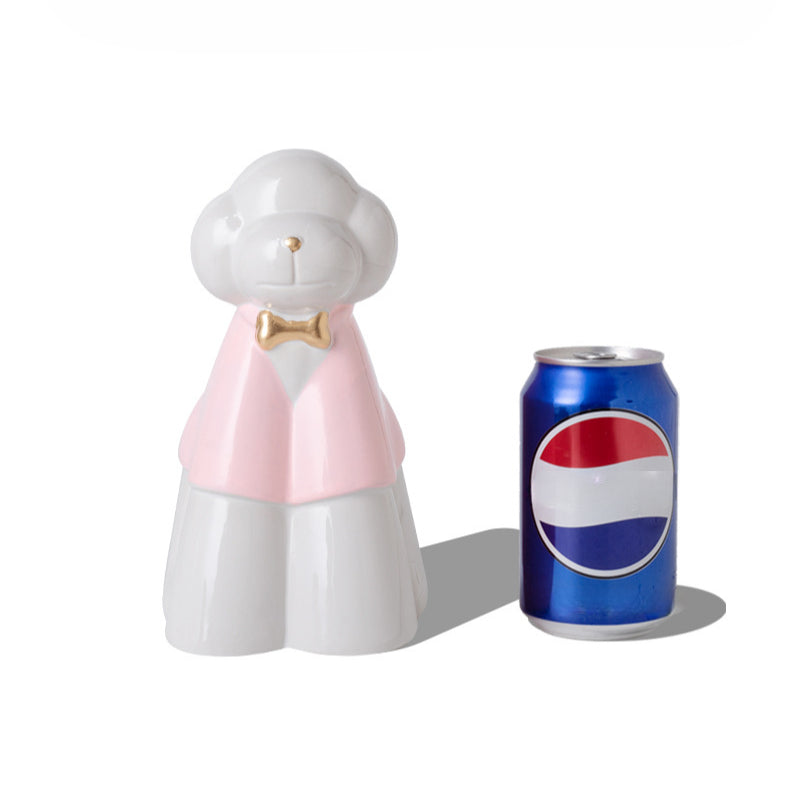 This pink poodle ceramic pet urn features an elegant design with a gold bow tie accent, standing 20.5cm tall, 12.5cm wide, and 11.5cm deep, holding 850ml of ashes. Weighing 589g, it’s perfect for North American pet owners memorializing medium-sized pets like dogs or cats, offering secure storage and a refined display for home shelves or mantels.