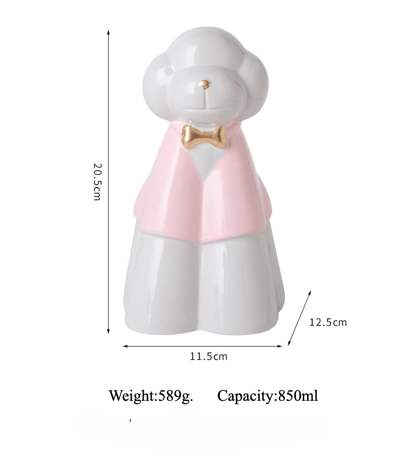 This pink poodle ceramic pet urn features an elegant design with a gold bow tie accent, standing 20.5cm tall, 12.5cm wide, and 11.5cm deep, holding 850ml of ashes. Weighing 589g, it’s perfect for North American pet owners memorializing medium-sized pets like dogs or cats, offering secure storage and a refined display for home shelves or mantels.