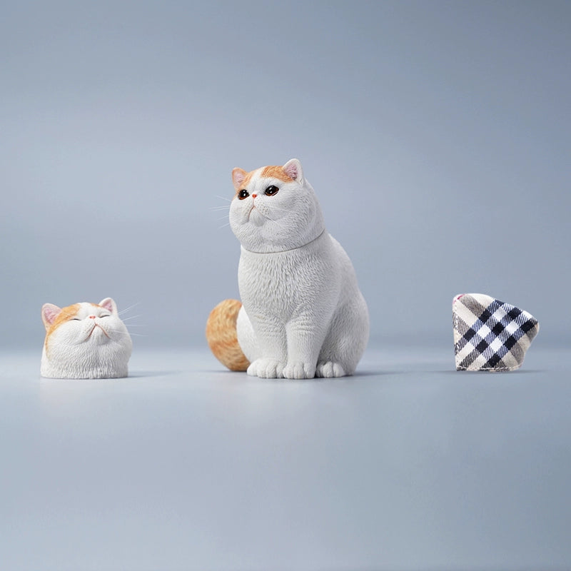 "A set of four Garfield cat resin models in different color variations, showcasing realistic fur details and changeable head designs."